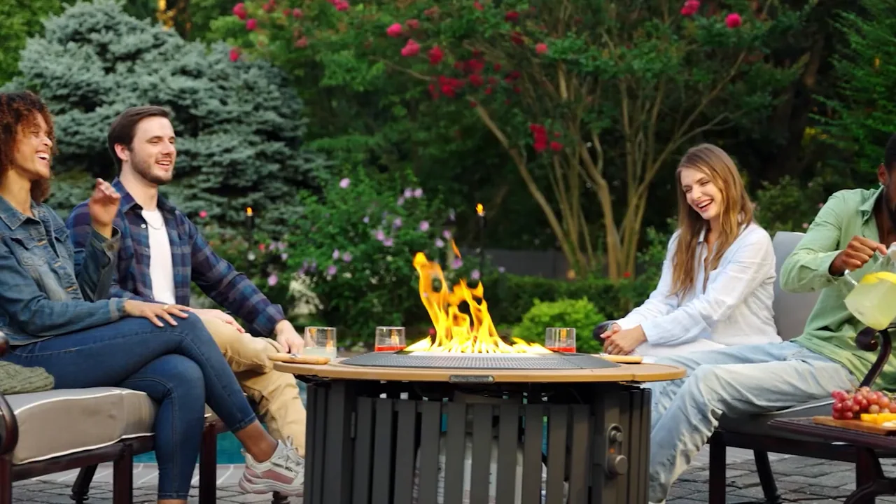 Friends gathered around a fire, from Evan's existing 2026 reel